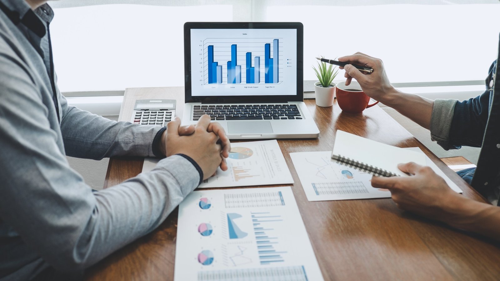 business-team-casual-collaboration-discussing-working-analysis-with-financial-data-and-marketing.jpg